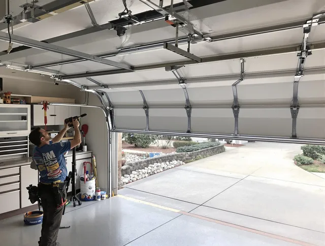 Garage door track repair service by Bennett Garage Door Repair in Bennett